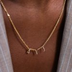 ketting letter goud